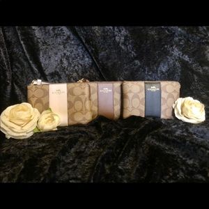 Black, Brown, White Coach Wristlet